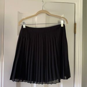 Pleated mini skirt.